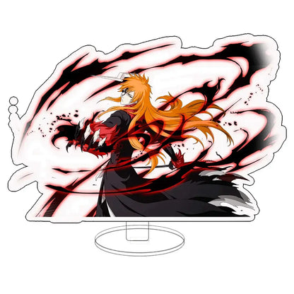 Orange-haired bleach ichigo acrylic keychain standee in black and red outfit with dynamic swirling background