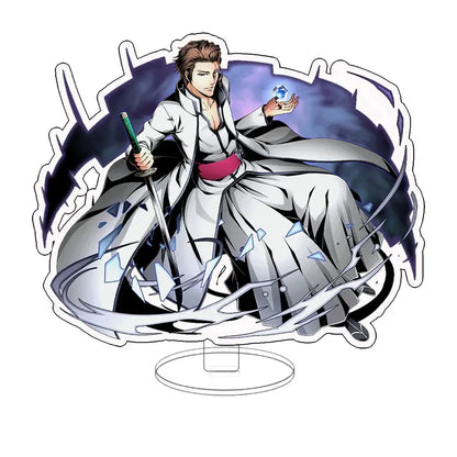 White and gray anime character acrylic keychain standee featuring ichigo in flowing robe holding sword with blue gem accents