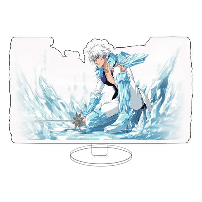 Clear acrylic keychain standee featuring white-haired anime character in icy blue attire kneeling among crystal ice formations
