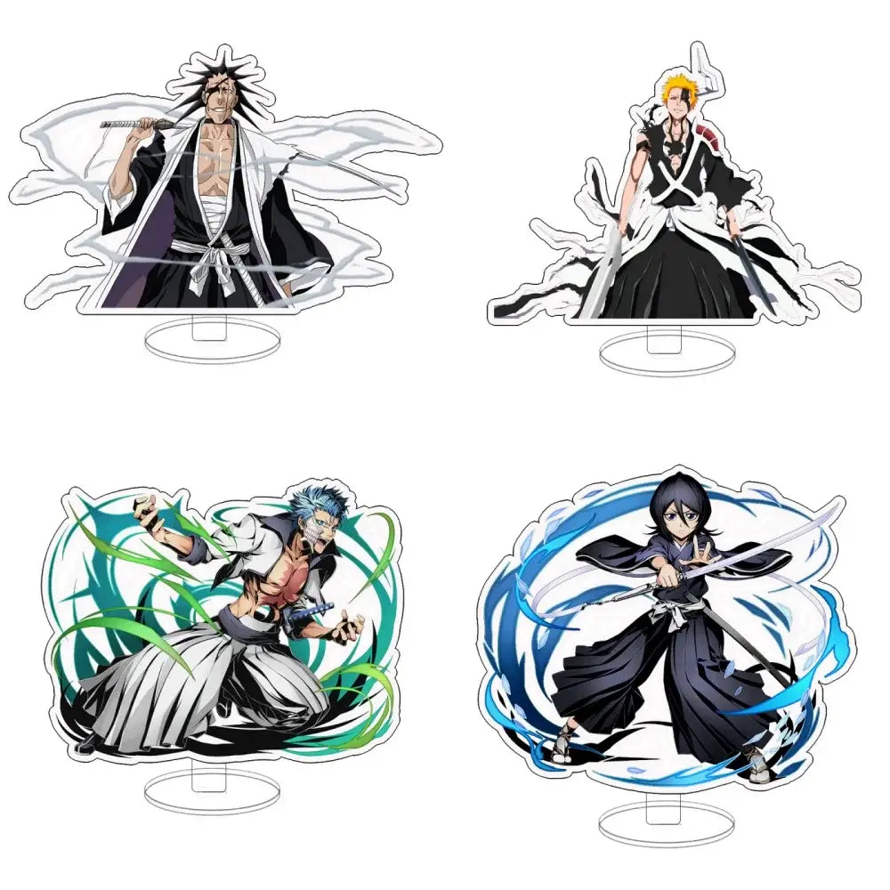 Four bleach anime character acrylic keychains featuring ichigo orihime and ishida in black and white outfits with blue and green energy effects
