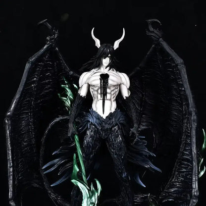 Bleach ichigo and ulquiorra pvc statue featuring black-winged horned figure with muscular physique and green glowing accents