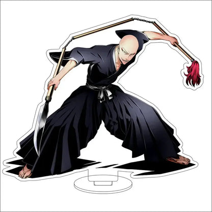 Black and white acrylic stand figure of bald anime character in robes wielding chain weapon with red tassels from bleach