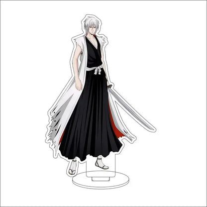 White and black acrylic stand figure of ichigo kurosaki from bleach in shinigami uniform with sword at his side