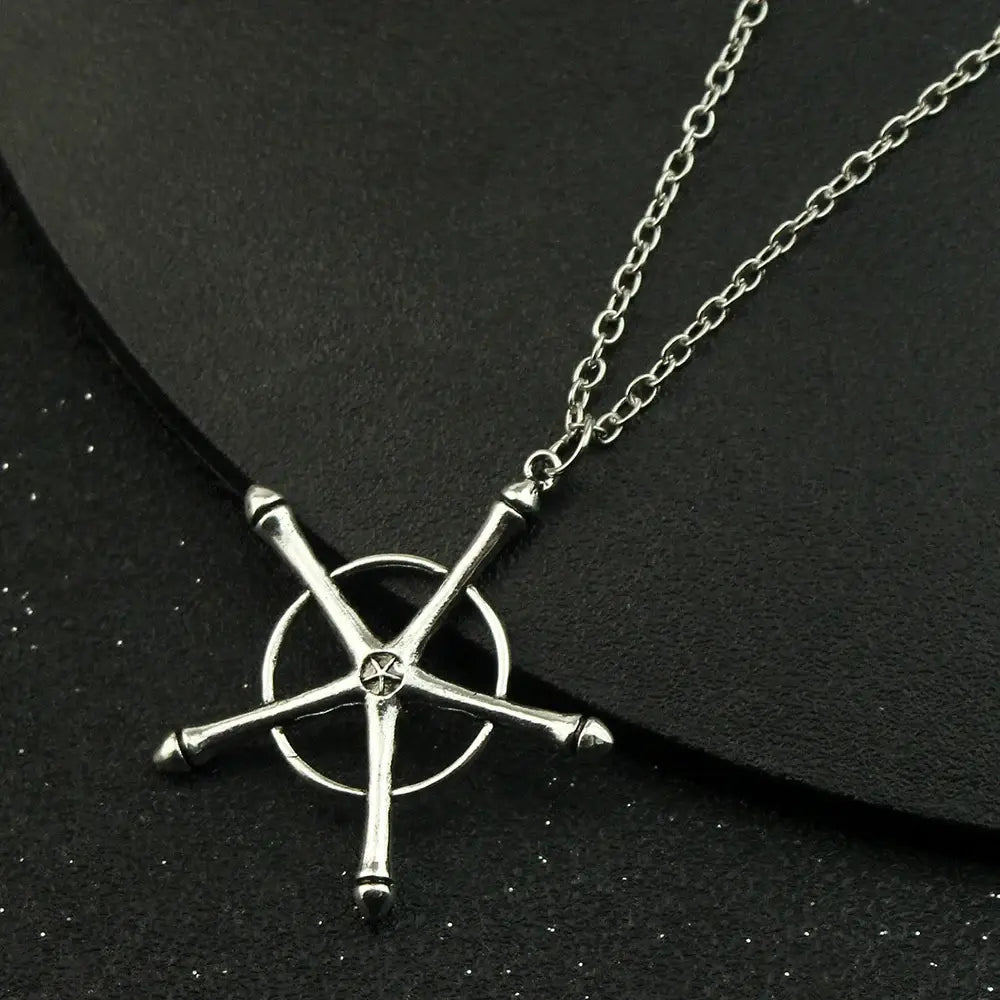 Silver-colored metal pendant necklace featuring ulquiorra cifer five-pointed star design with circular center and chain
