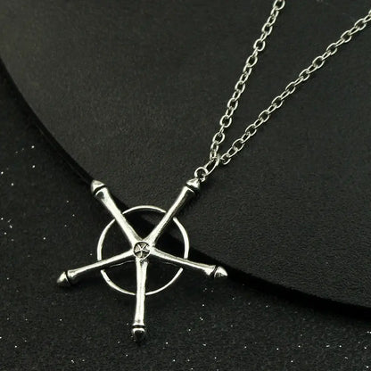 Silver-colored metal pendant necklace featuring ulquiorra cifer five-pointed star design with circular center and chain