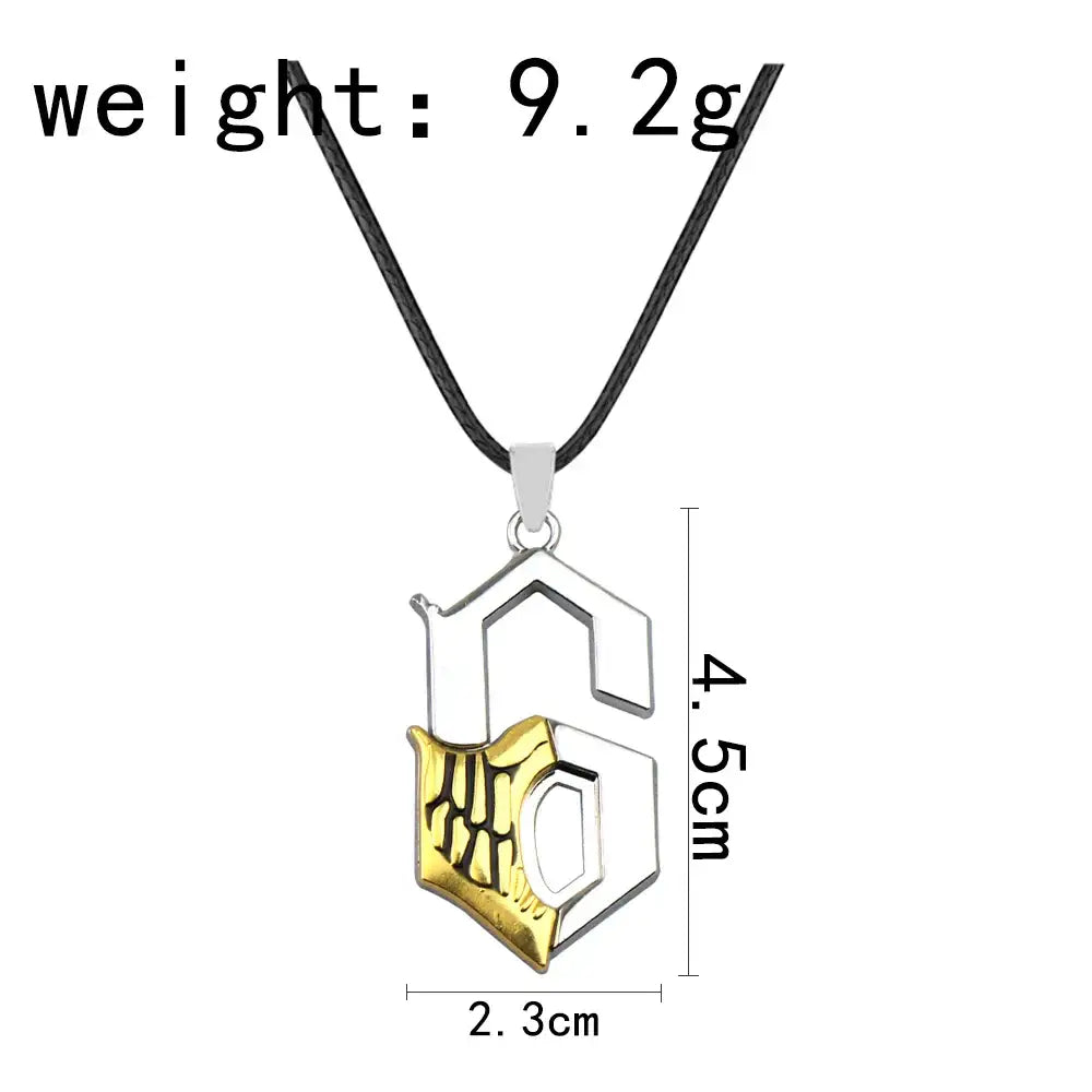 Silver and gold two-tone ulquiorra cifer mask metal pendant necklace with stylized g design and intricate detailing