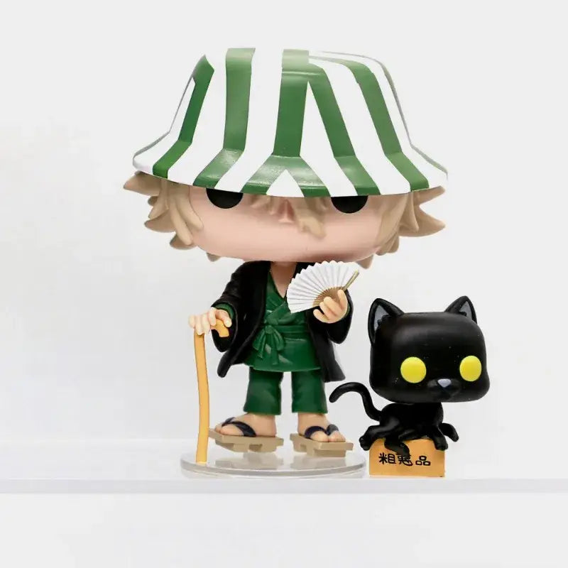 Funko pop figure of urahara kisuke with blonde hair holding a fan and cane beside yoruichi shihouin black cat