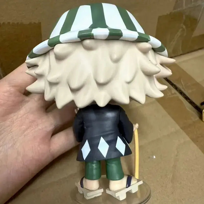 Bleach urahara kisuke pvc figure with green and white striped hat and off-white spiky hair on black coat with blue diamonds