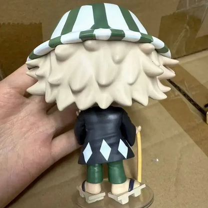 Bleach urahara kisuke pvc figure with green and white striped hat and off-white spiky hair on black coat with blue diamonds
