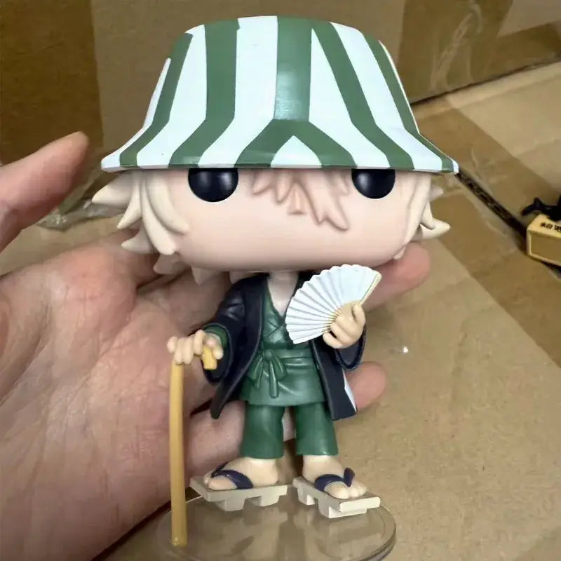 Bleach urahara kisuke pvc figure with green and white striped hat, green kimono, black robe holding fan and cane