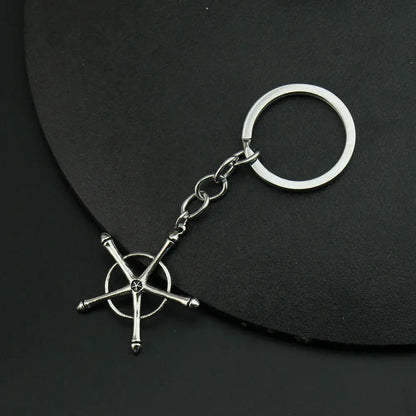 Silver metallic Bleach Uryuu Ishida amulet necklace featuring a five-pointed star alloy keychain with split ring clasp