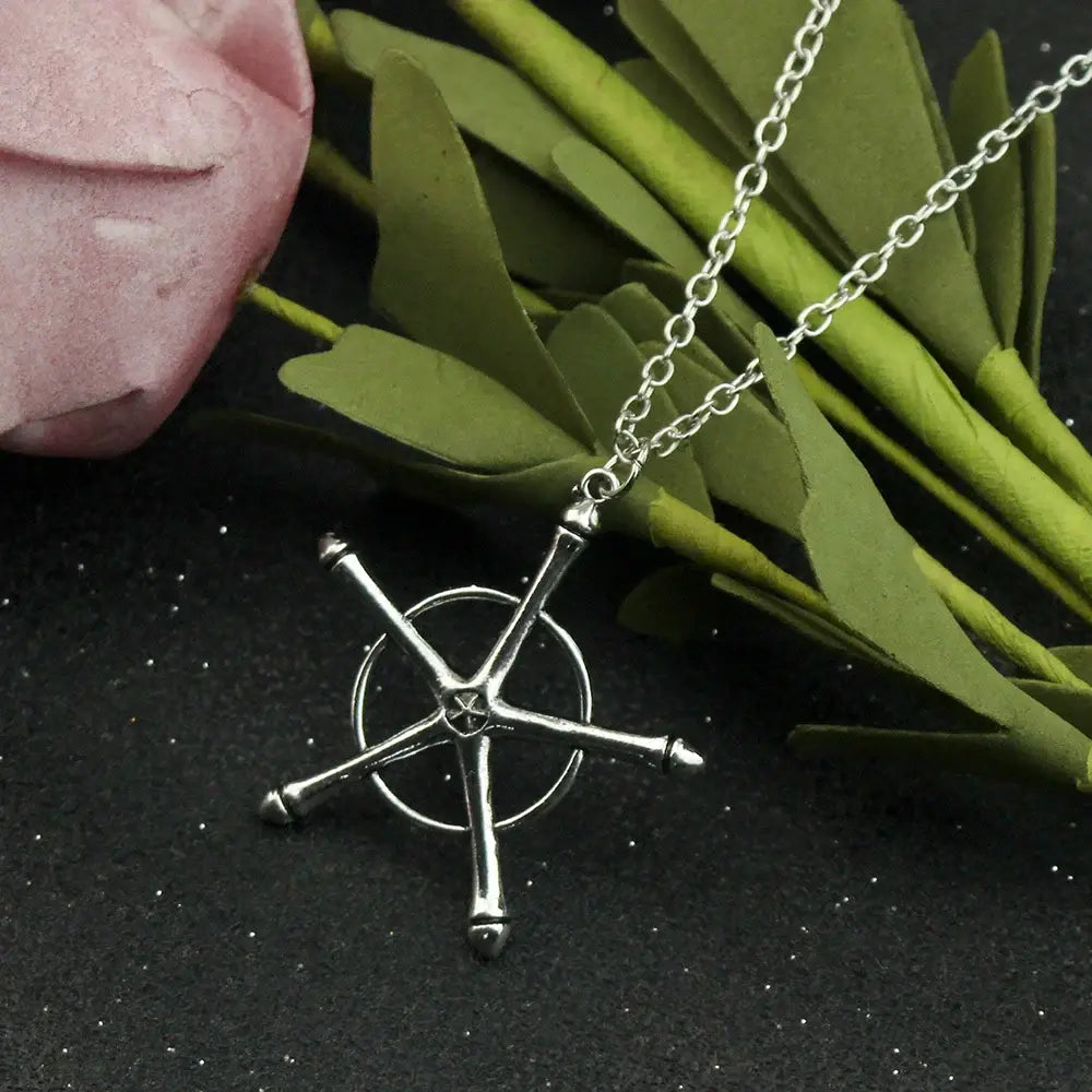 Silver-toned bleach uryuu ishida amulet necklace with stylized cross pendant on alloy choker chain