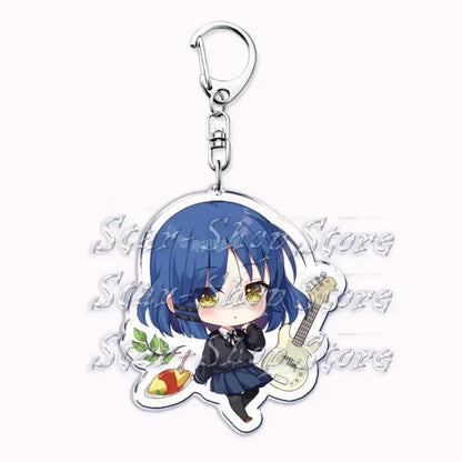 Blue-haired hitori gotoh chibi anime keychain with white guitar and food plate made of clear acrylic cartoon accessory