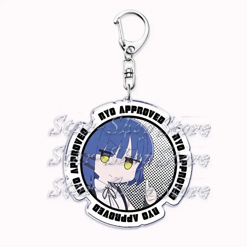 Clear acrylic keychain featuring chibi hitori gotoh with blue hair yellow eyes and ryo approved text in black lettering