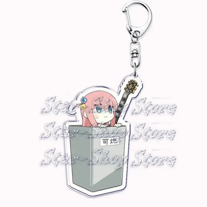 Pink-haired hitori gotoh keychain with blue eyes peeking from gray trash can holding guitar made of clear acrylic