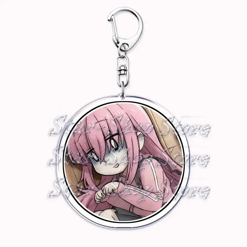 Circular acrylic keychain featuring hitori gotoh anime character with long pink hair and silver metal clasp