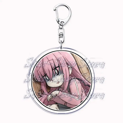 Circular acrylic keychain featuring hitori gotoh anime character with long pink hair and silver metal clasp