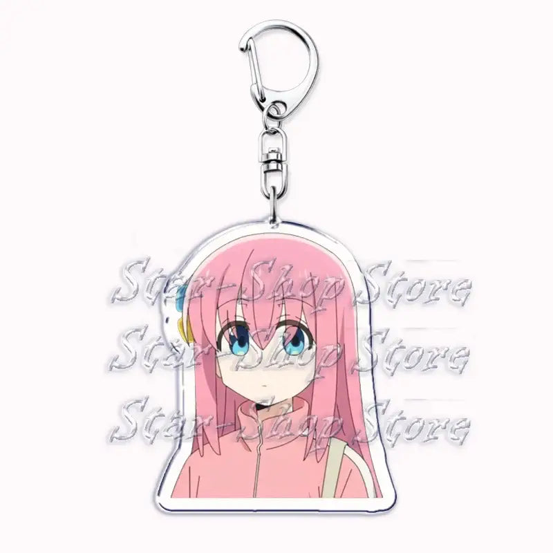 Pink-haired hitori gotoh keychain with blue eyes and pink jacket made of clear acrylic with silver metal clasp