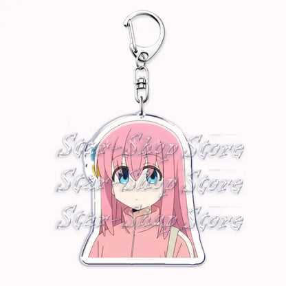 Pink-haired hitori gotoh keychain with blue eyes and pink jacket made of clear acrylic with silver metal clasp