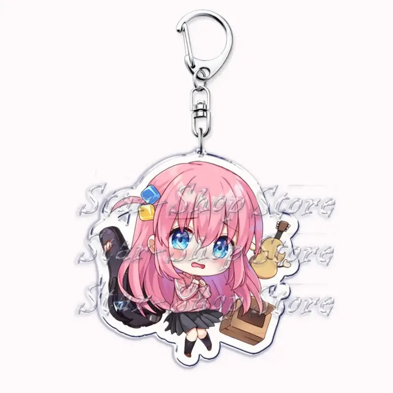 Pink-haired hitori gotoh anime chibi keychain with blue eyes made of transparent acrylic from bocchi the rock