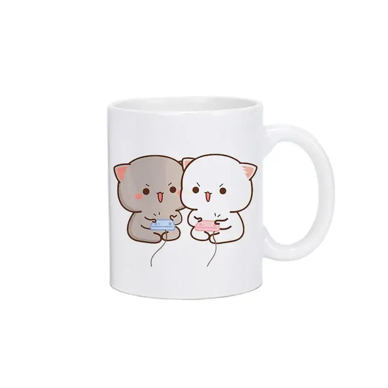 White ceramic bubu dudu panda bear christmas mug with cute gray and white cats holding game controllers kawaii cup