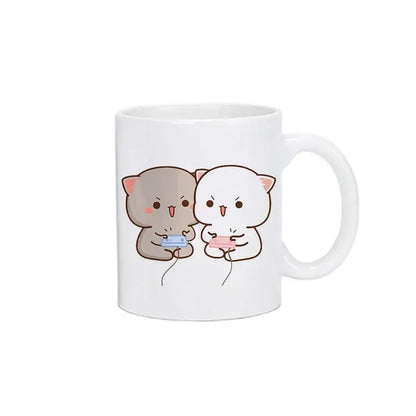 White ceramic bubu dudu panda bear christmas mug with cute gray and white cats holding game controllers kawaii cup