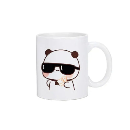 White ceramic mug featuring bubu dudu panda wearing black sunglasses and holding money in a kawaii design