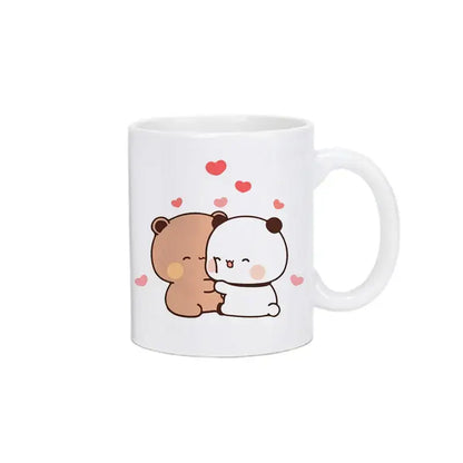 White ceramic bubu dudu panda bear christmas mug with cute cartoon pandas and bear hugging surrounded by red hearts