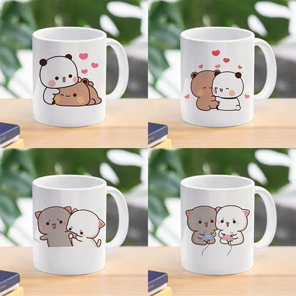 White ceramic bubu dudu panda bear christmas mug with cute cartoon animal designs pink hearts and playful expressions