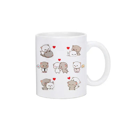 White ceramic bubu dudu panda bear christmas mug featuring cute cartoon cats with red hearts and pastel accents