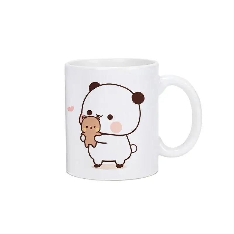 White ceramic bubu dudu panda bear christmas mug with cute cartoon panda holding teddy bear and blush pink cheeks
