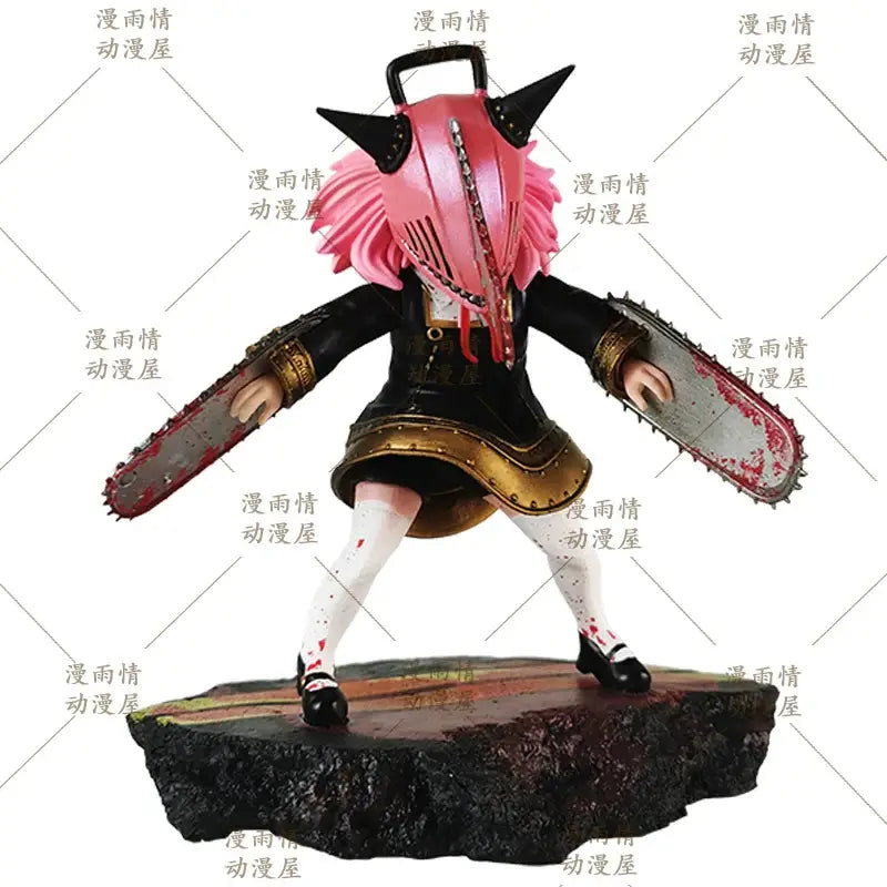Pink-haired anya forger chainsaw man desktop ornament in black and gold outfit holding two chainsaws on rocky base