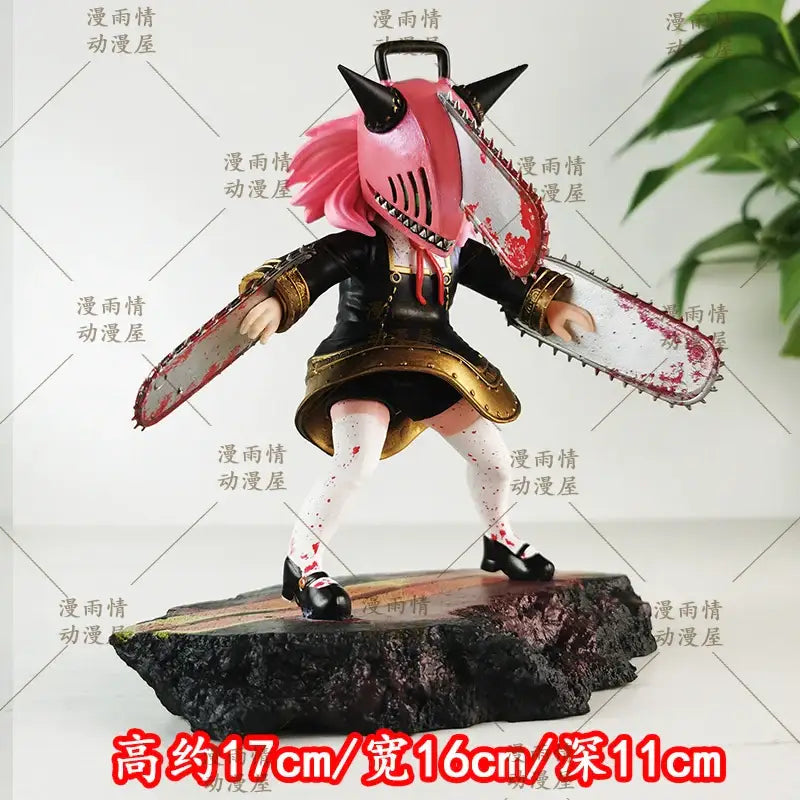 Pink-haired anya forger garage kit from chainsaw man featuring black horns chainsaw and black gold outfit