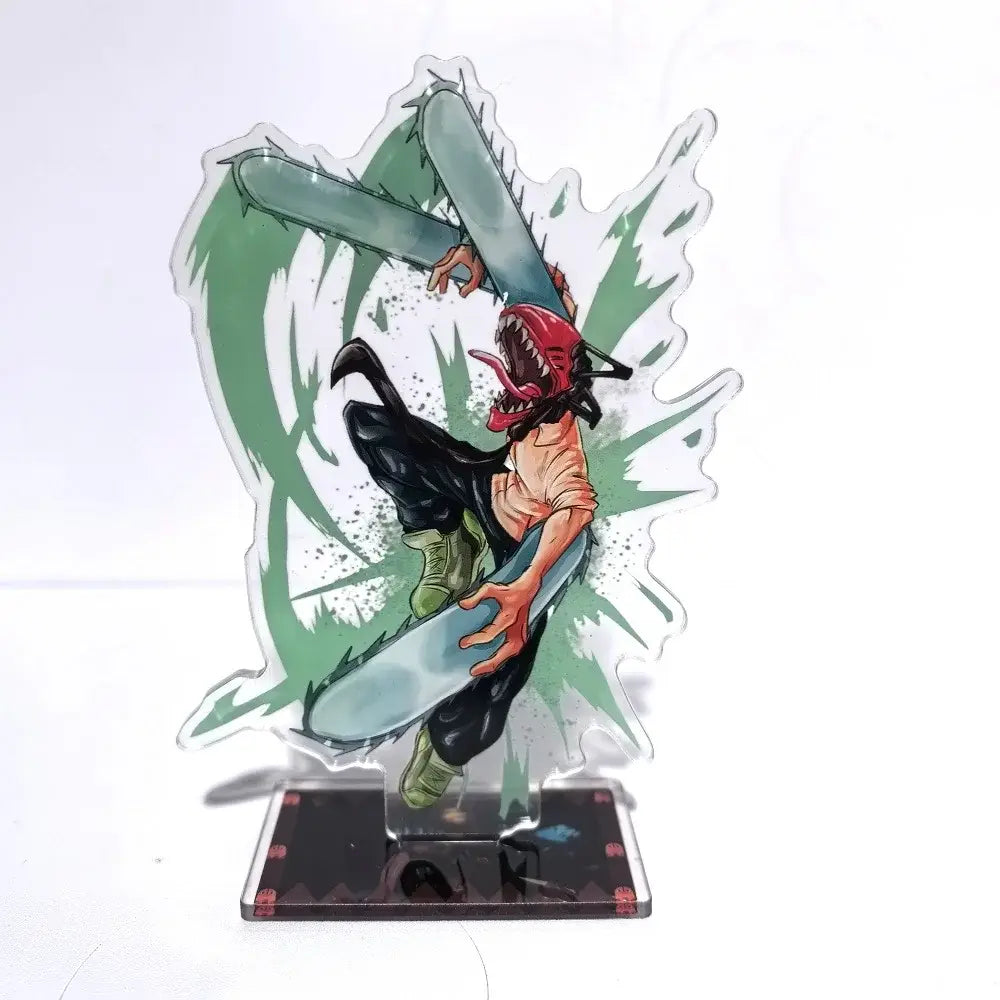 Clear acrylic chainsaw man denji stand with red mask and chainsaw mid-air on green splatter desktop decor 15cm