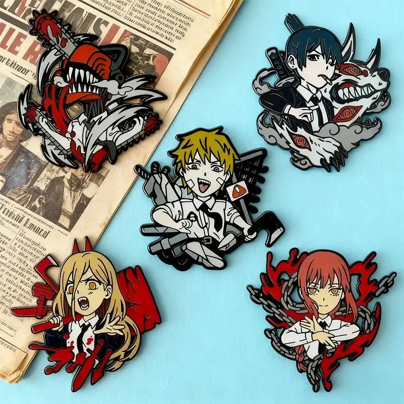 Set of five chainsaw man anime enamel pins featuring dynamic black red and white designs on metal brooches