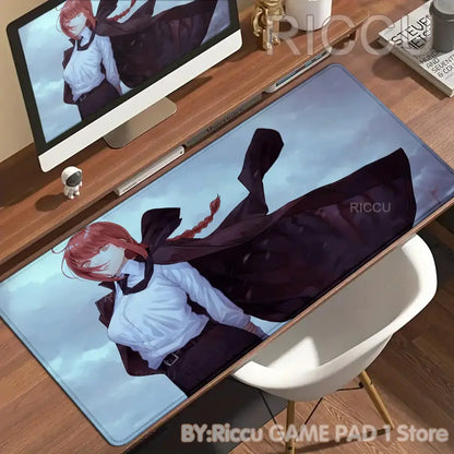 Chainsaw man denji desk mat features a soft textured red haired anime character mouse pad with non slip surface