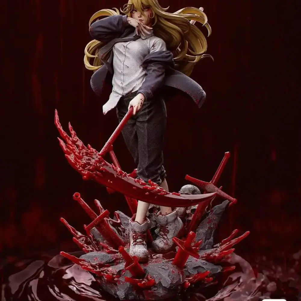 A detailed resin statue of blonde chainsaw man denji wielding a large red sword with blood effects from a mystery box gold editions
