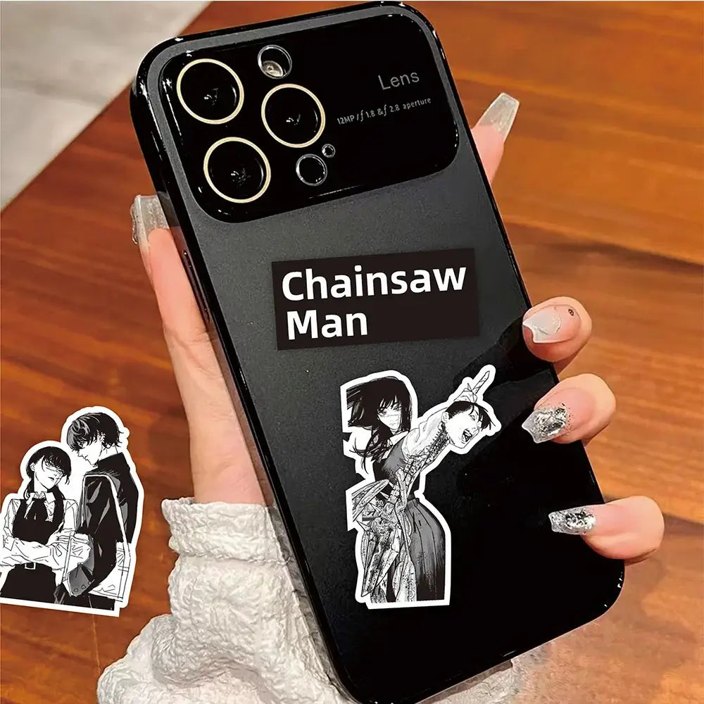 Black glossy phone case with chainsaw man anime artwork and white manga sticker pack on the back side