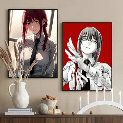 Two framed chainsaw man makima canvas wall art prints featuring a red-haired girl in grayscale and a black-and-white figure on red background