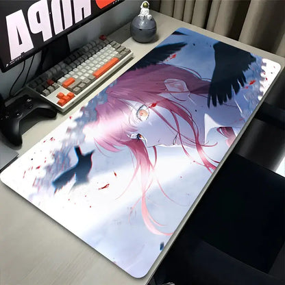 Rectangular glossy finish chainsaw man makima mouse pad with pink hair character and black wings on light blue background