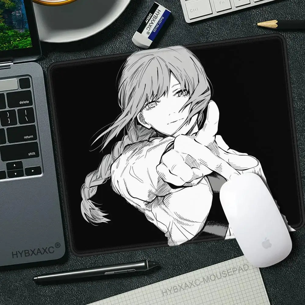 Black mouse pad desk mat featuring detailed black and white chainsaw man makima anime illustration pointing forward