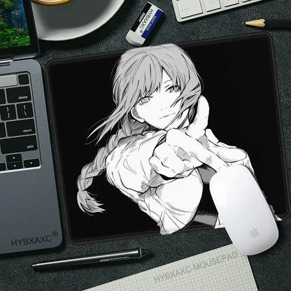 Black mouse pad desk mat featuring detailed black and white chainsaw man makima anime illustration pointing forward