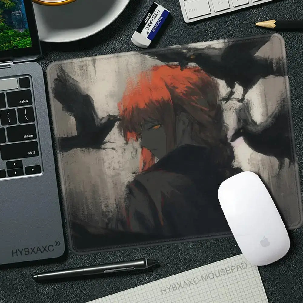 Black and gray non-slip desk mat featuring chainsaw man makima with vibrant orange hair and dark crows mouse pad