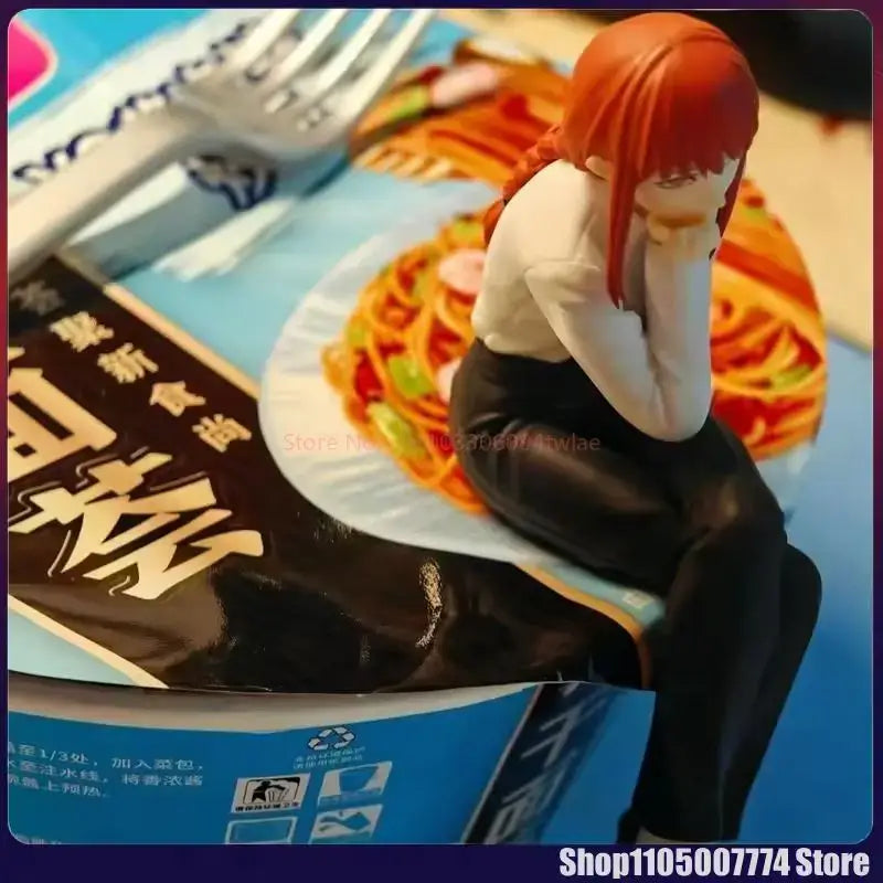 Chainsaw man makima noodle stopper figure with red hair white blouse black skirt seated on noodle package pvc 14cm