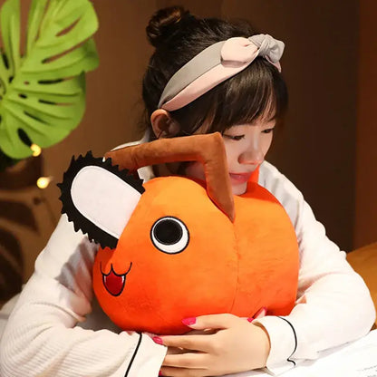 Chainsaw man pochita plush pendant featuring an orange soft stuffed chainsaw pillow with black and white blade detail