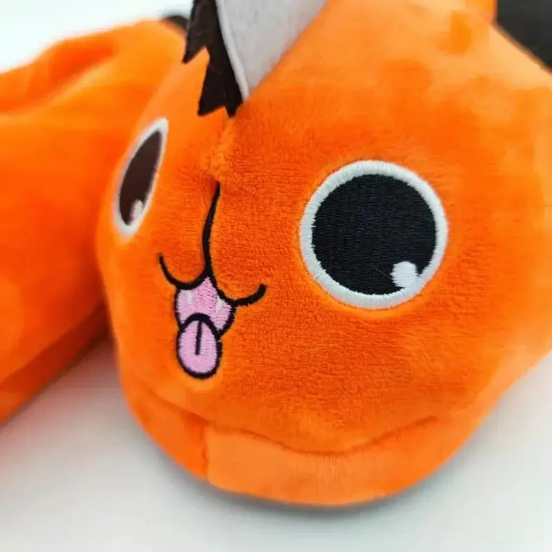 Orange pochita plush slipper featuring soft orange plush, embroidered eyes, pink tongue, and stitched ears plush slippers