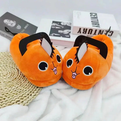 Chainsaw man pochita plush slippers in soft orange plush shaped like a chainsaw with cartoonish eyes and tongues