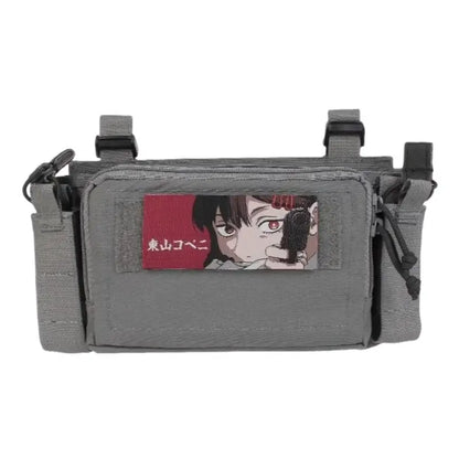 Gray tactical pouch with chainsaw man power embroidered patch featuring red and black anime design and loop backing