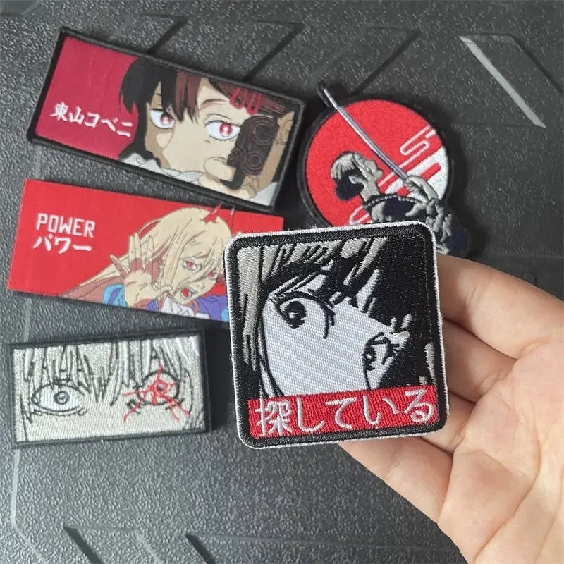 Black and white chainsaw man power embroidery patch with red japanese text and hook-and-loop backing badge