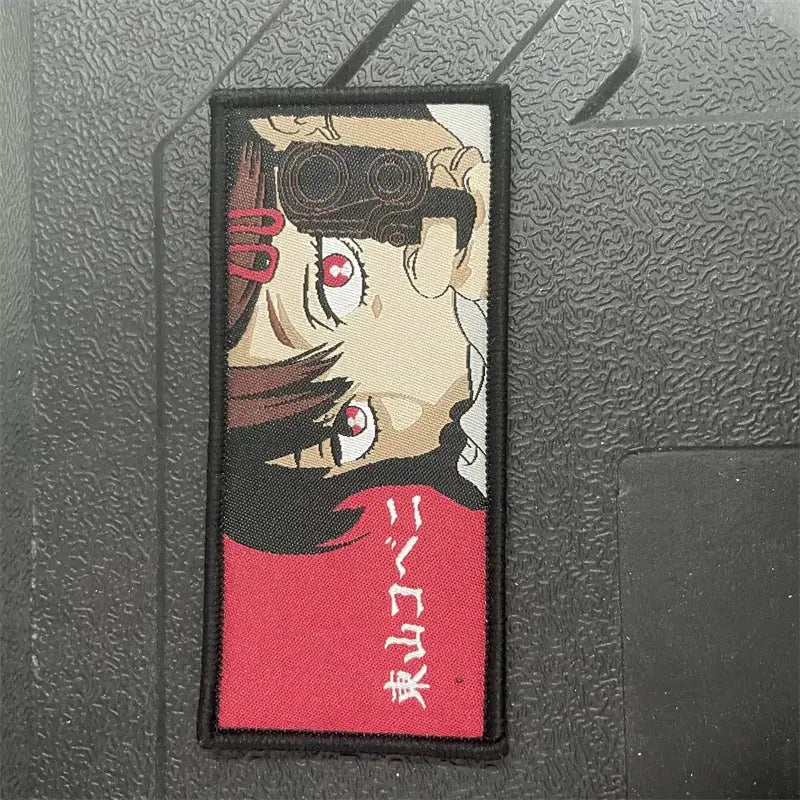 Chainsaw man power embroidery patch with hook-and-loop backing featuring anime character with red eyes and brown hair
